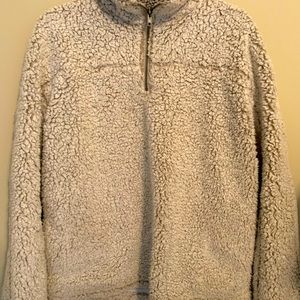 Warm and fully lined Sherpa-type pull-over.